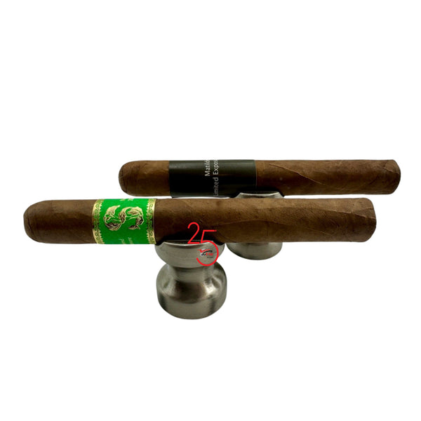 Two cigars on a metal stand with visible branding on a white background