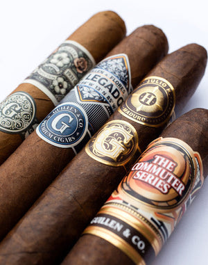 Assorted Guillen cigars with visible branding on a white background