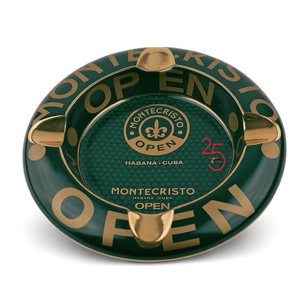 Green and gold Montecristo Open ashtray on a white background